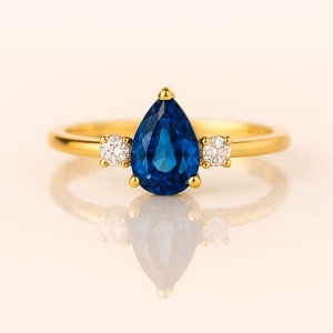 ANEL GOTA PEDRA AZUL COM ZIRCONIA