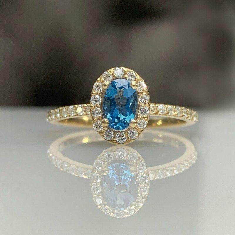 ANEL PRINCESA OVAL AZUL AGUA CRAVEJADO