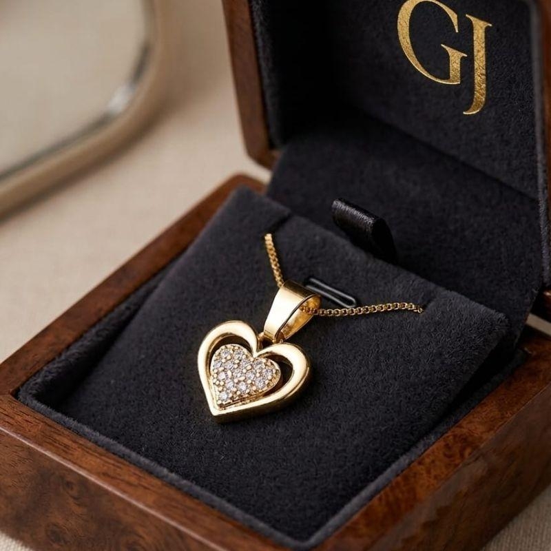 PINGENTE CORAÇAO MEIO CRAVEJADO