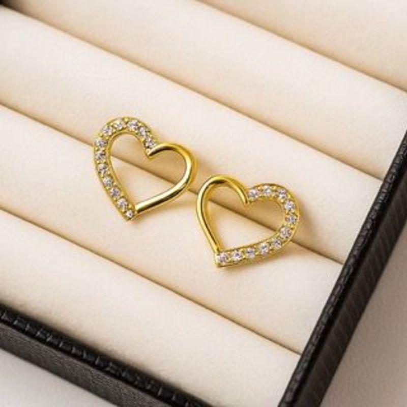 BRINCO CORAÇAO VAZADO C/ ZIRCONIAS