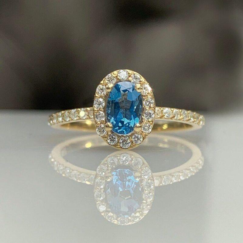 ANEL PRINCESA OVAL AZUL AGUA CRAVEJADO