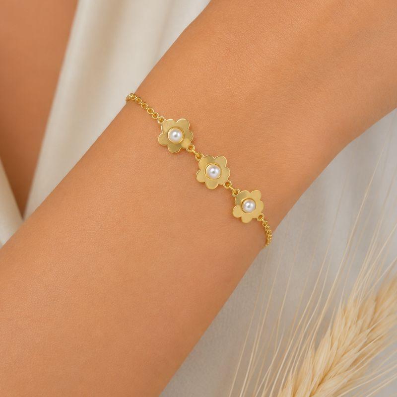 PULSEIRA FLOR C PEROLA NO MEIO